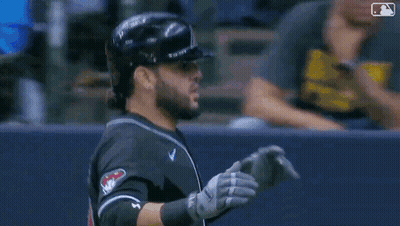 Baseball Player In Helmet And Catcher's Gear In Dugout GIF