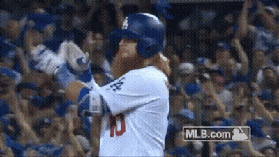Baseball Player In Helmet And Gloves Before Crowd GIF