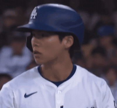 Baseball Player In Helmet And Jersey GIF