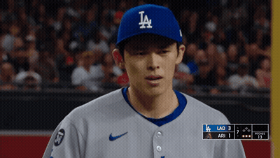 Baseball Player In LA Hat Looking Down GIF