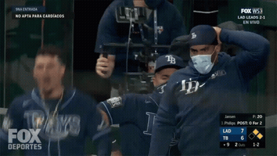 Baseball Player in Mask and TB Cap
