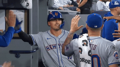 Baseball Player In Mets Uniform High Fiving Teammates GIF