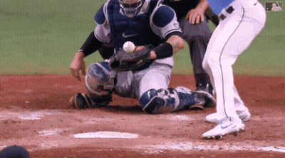 Baseball Player In Nike Jersey Sliding Into Base GIF