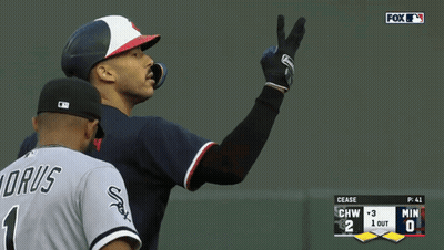 Baseball Player In Number 1 Jersey Talks To Another GIF