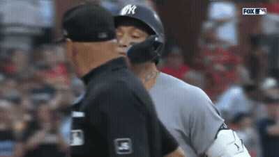 Baseball Player In NYC Helmet Talks To Referee GIF