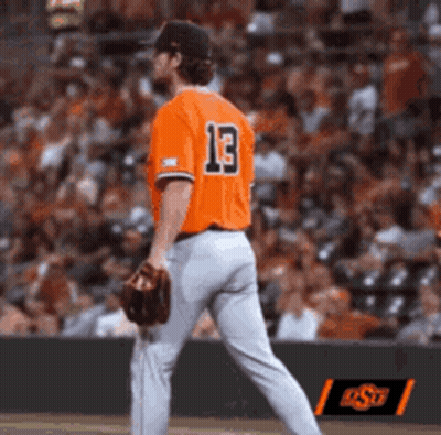 Baseball Player In Orange Jersey Number 13 GIF