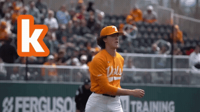 Baseball Player In Orange Jersey With Letter K GIF
