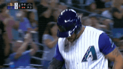 Baseball Player In Purple Jersey With Letter A GIF