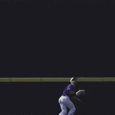Baseball Player In Purple Uniform Sliding Into Base GIF