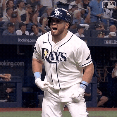 Baseball Player in Rays Jersey Standing on Field
