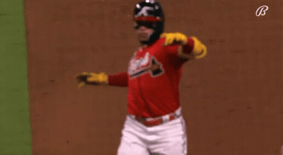 Baseball Player In Red And Yellow Uniform Running GIF