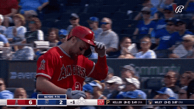 Baseball Player In Red Angels Jersey In Dugout GIF