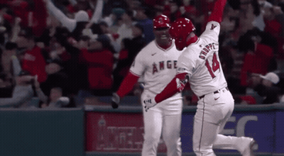 Baseball Player In Red Angels Jersey In Dugout GIF