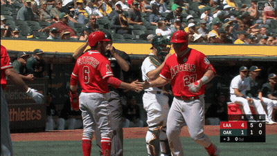 Baseball Player In Red Angels Jersey Shaking Hands GIF