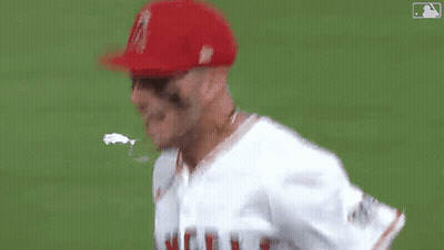 Baseball Player In Red Hat And White Shirt GIF