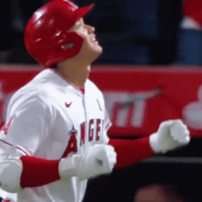 Baseball Player In Red Helmet And Gloves Standing In Outfield GIF