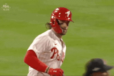 Baseball Player In Red Helmet And White Jersey GIF