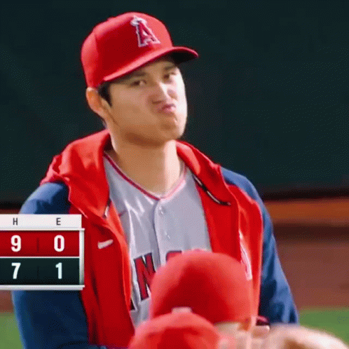 Baseball Player In Red Jacket And Red Hat With Letter A GIF