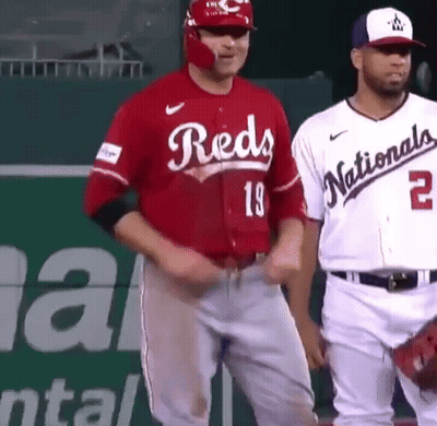 Baseball Player In Red Jersey Next To Player In White Jersey GIF