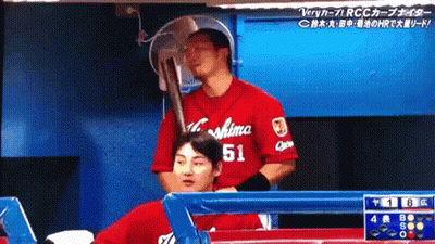Baseball Player In Red Shirt Number 51 GIF