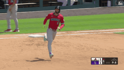 Baseball Player In Rockies Jersey Running To Base GIF