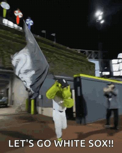 Baseball Player In Shrek Costume Holding Flag Saying Let's Go White Sox GIF