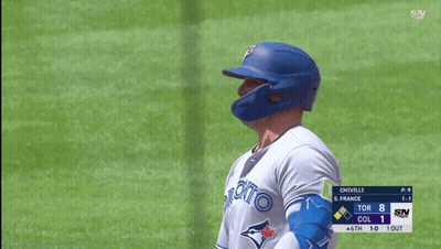 Baseball Player In Toronto Jersey Looking At Scoreboard GIF