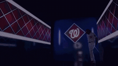 Baseball Player In Tunnel With Washington Nationals Logo GIF