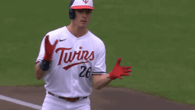 Baseball Player In White Jersey And Red Gloves Running GIF