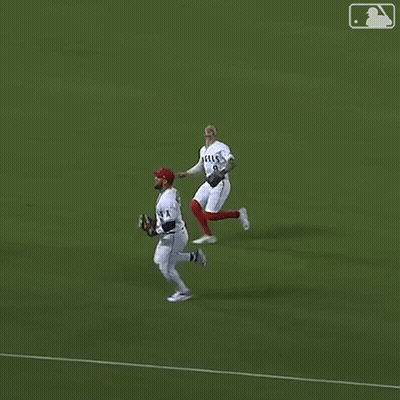 Baseball Player In White Jersey Number 9 Sliding Into Base GIF