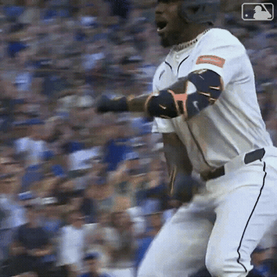 Baseball Player in White Uniform With MLB Logo