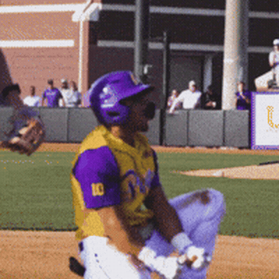 Baseball Player In Yellow And Purple Jersey Number 10 GIF
