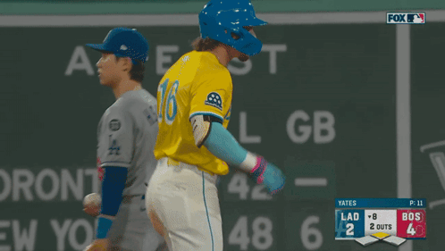 Baseball Player In Yellow Jersey Number 16 GIF