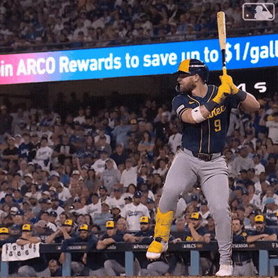 Baseball Player Interviewed by Woman With Microphone