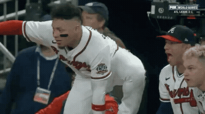 Baseball Player Kneeling In Dugout GIF