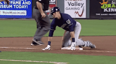 Baseball Player Kneeling In Front Of Valley Gaming Sign GIF