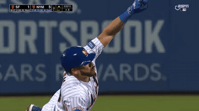 Baseball Player Laying In Front Of ESPN Ad GIF