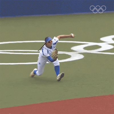 Baseball Player Laying On His Back Catching Ball GIF