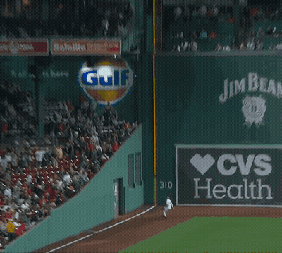 Baseball Player Leaning Against Wall GIF