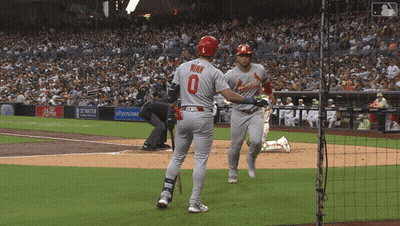Baseball Player Number 0 Running To Another Player GIF