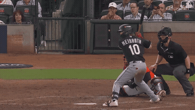 Baseball Player Number 10 Swinging At Ball GIF