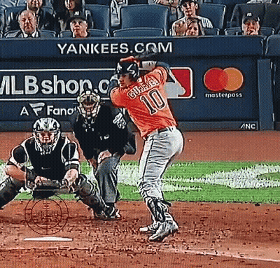 Baseball Player Number 10 Swinging At Ball GIF