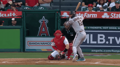 Baseball Player Number 12 Swinging At Pitch GIF
