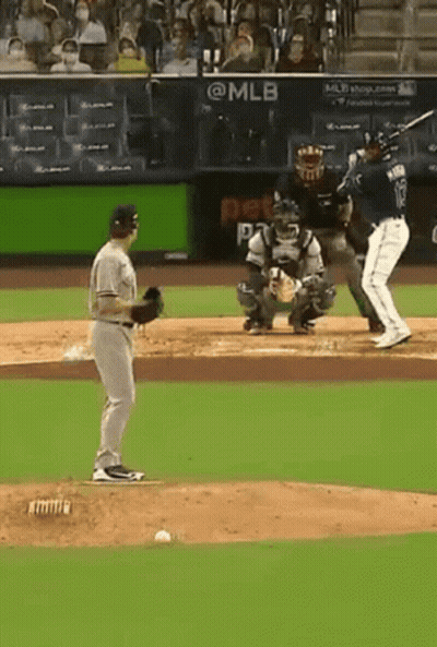Baseball Player Number 12 Swinging At Pitch GIF