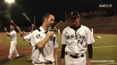 Baseball Player Number 14 Talking To Reporter GIF