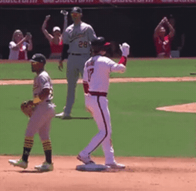 Baseball Player Number 17 Walking Towards Base GIF