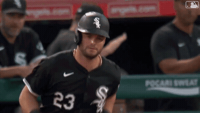 Baseball Player Number 23 Running Towards Dugout GIF