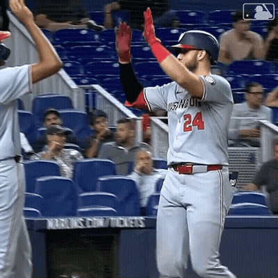 Baseball Player Number 24 High Fives Teammate GIF