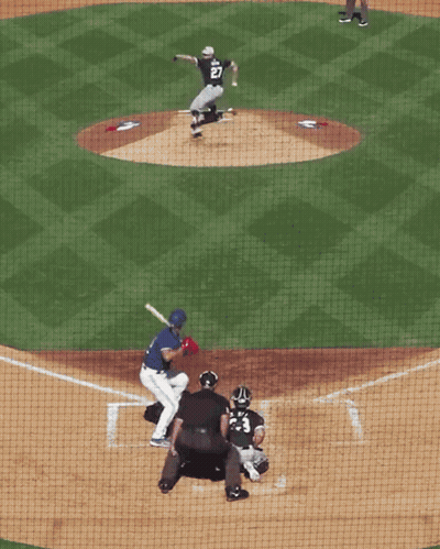 Baseball Player Number 27 Swinging At Pitch GIF