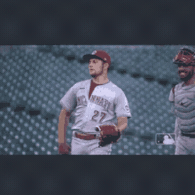 Baseball Player Number 27 Walking With Catcher GIF